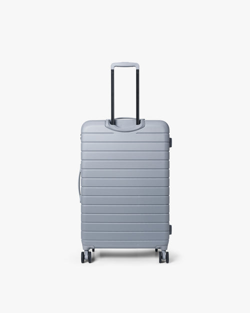 Large 28" Tonal Logo Check-In Suitcase